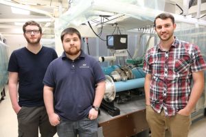 Laser-electro-optic technicians Davian Tevault, Tyler Dumbacher, and Ryland Plummer work in different parts of Lawrence Livermore National Laboratory. Tevault and Dumbacher characterize and align the injection laser system at the National Ignition Facility. Plummer works in the test chamber pictured here.