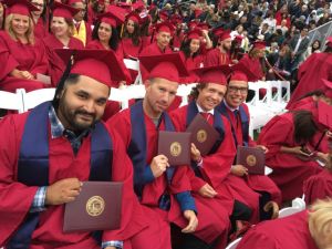 Veterans enjoy Saddleback College graduation ceremony. 