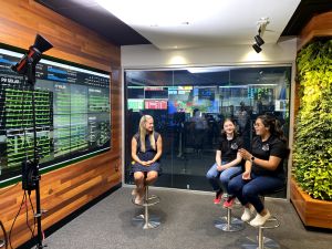 Girls in STEM interviewed Sydney Eisinger (left), a control room technician at NextEra Energy and IRSC graduate.    