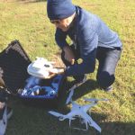 J. Scott Sires, Dallas College geospatial technology professor, unpacks a drone purchased with an ATE grant he led. 